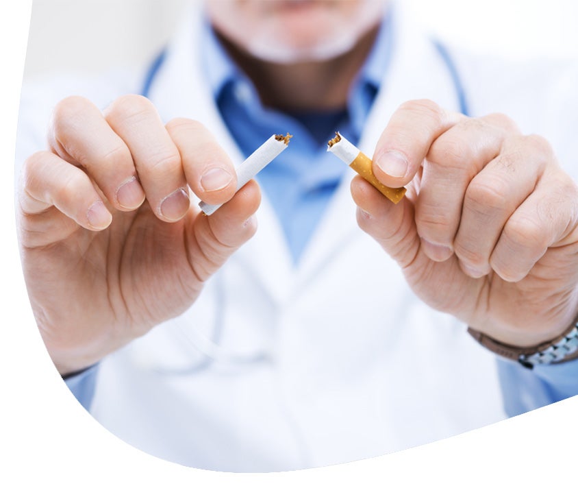 A doctor getting rid of a cigarette